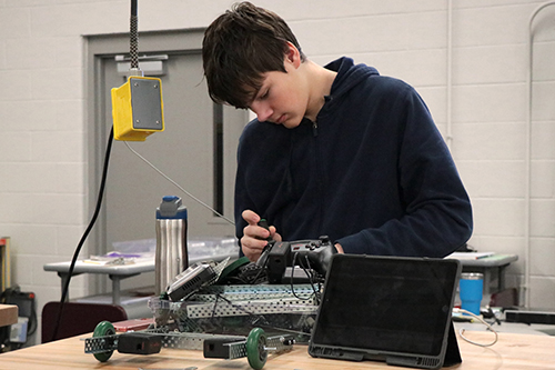 A student works on a robotics assignment